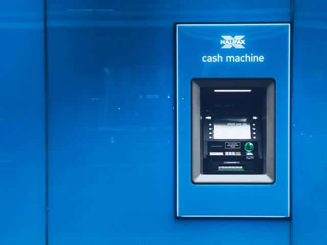Blue ATM machine in bright setting