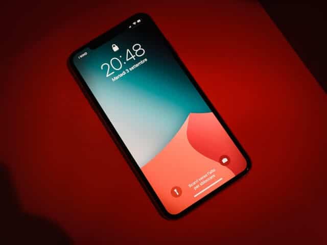 Mobile Phone on Red Background
