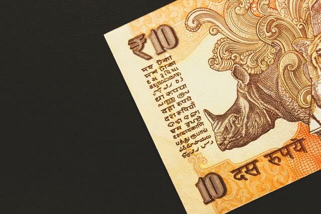 Indian 10 Rupees on a Black Background